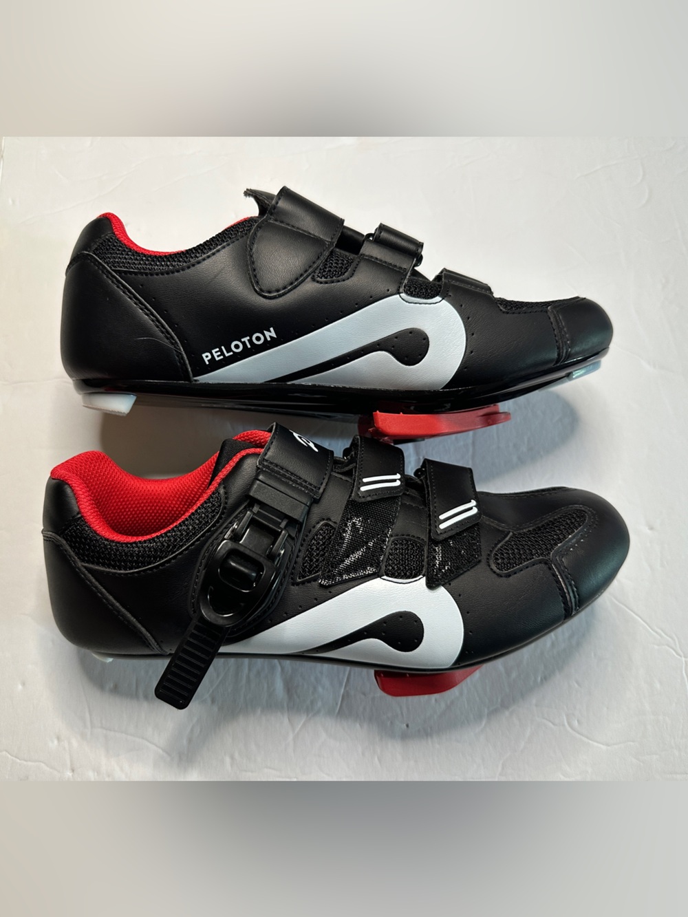 NWOT Peloton Unisex  Black and White Cycling Sneakers with Red Lining Size 40